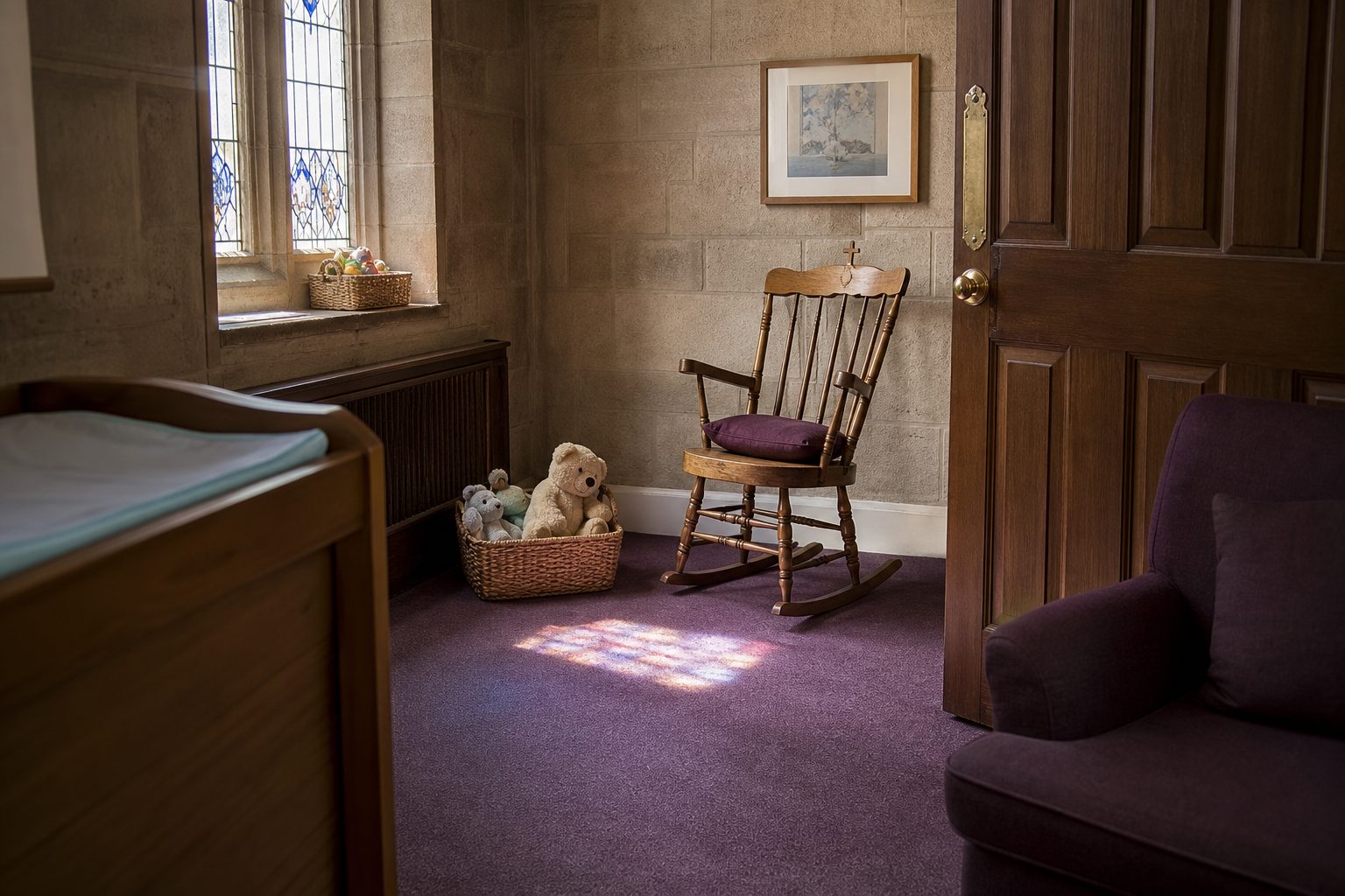 Empty church nursery at dawn with a wooden rocking chair, low toy basket and soft light from a side window.